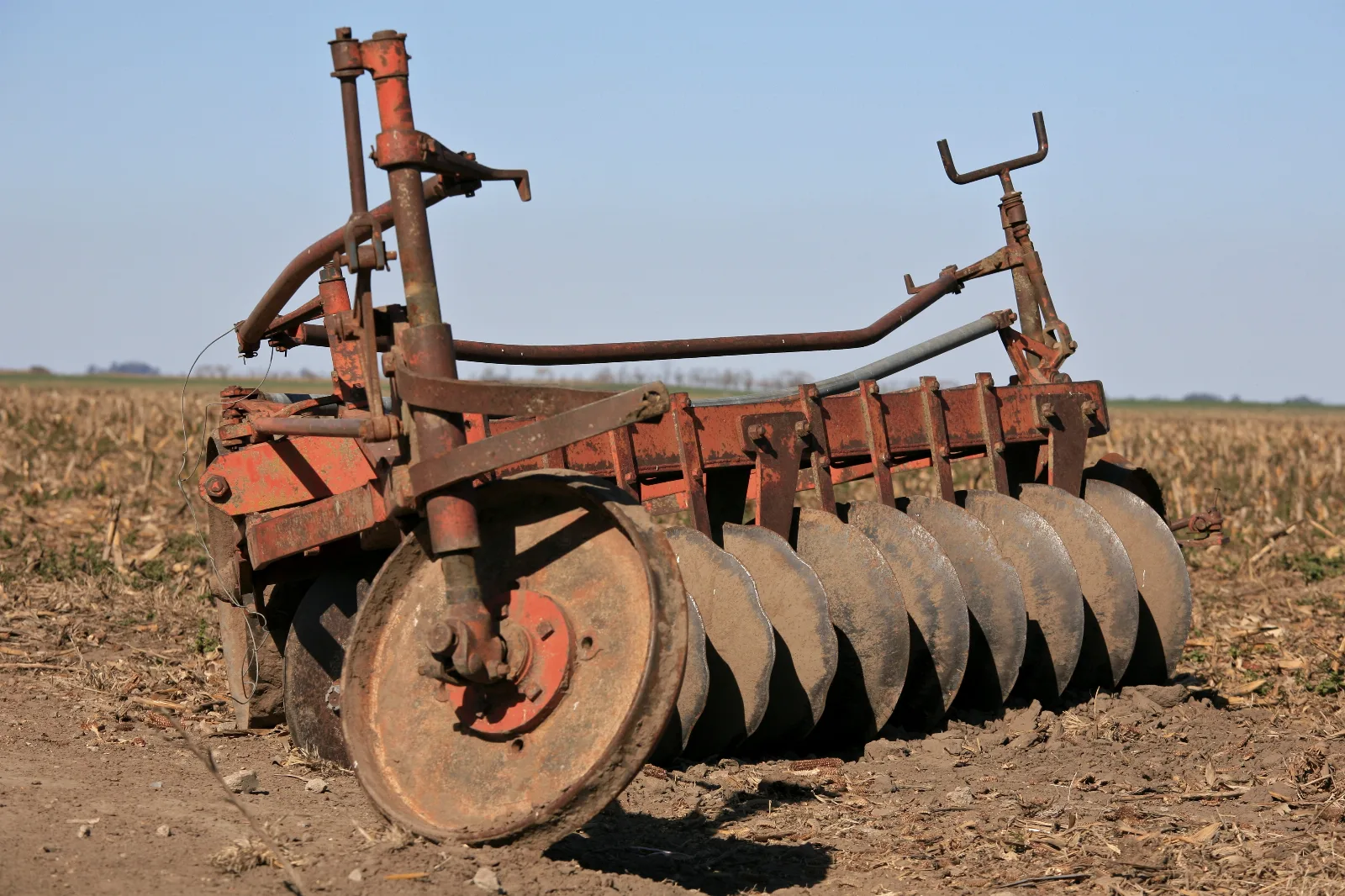 The plough or plow (see spelling differences;  /ˈplaʊ/) is a tool used in farming for initial cultivation of soil in preparation for sowing seed or planting. It has been a basic instrument for most of